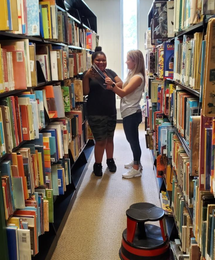 Students browse the shelves at the public library