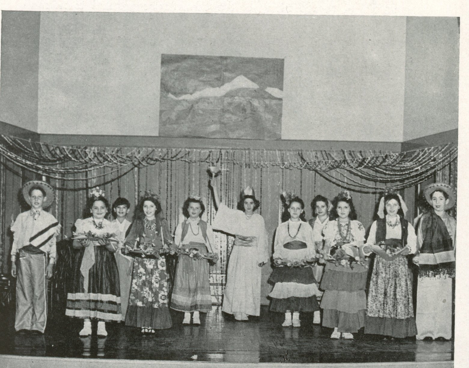 A student performance on the auditorium stage