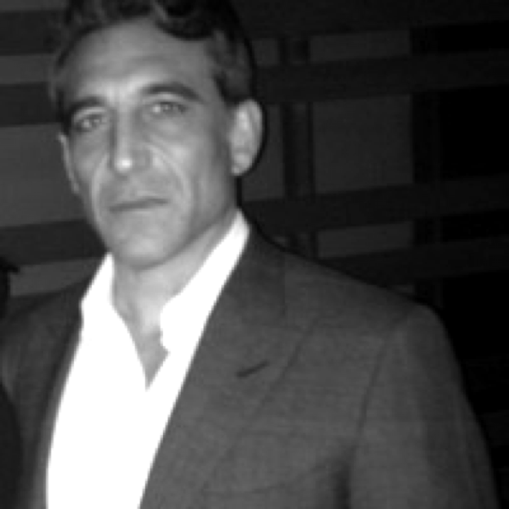 Black and white portrait of a man in a suit