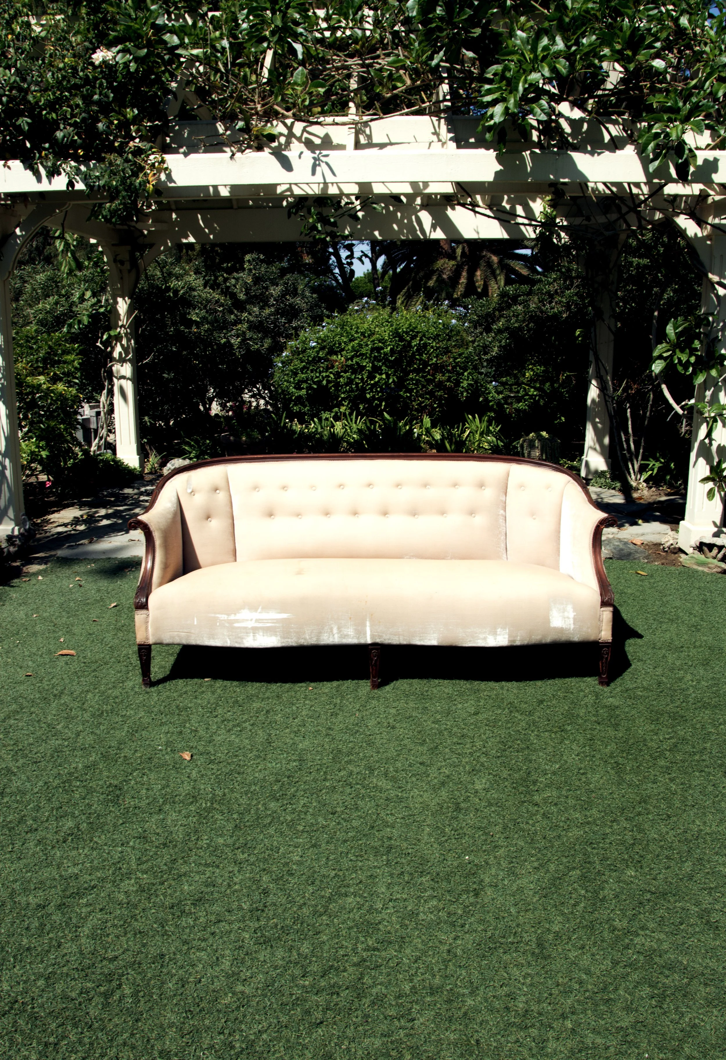 Ivory Couch Dark Wood Trim.jpg
