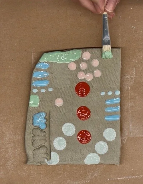 painting slab of clay