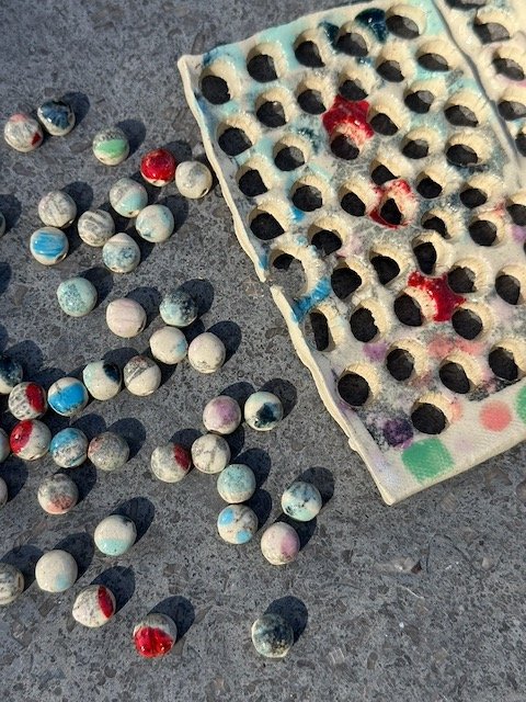 glazed dots with the fired series "skeleton"