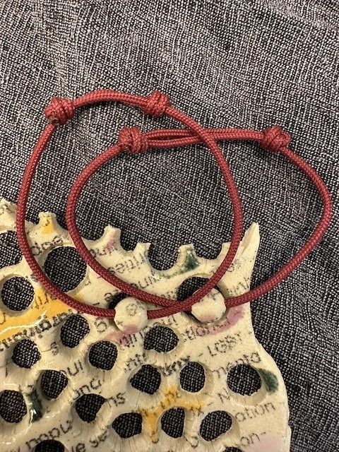 dot bracelets on the skeleton
