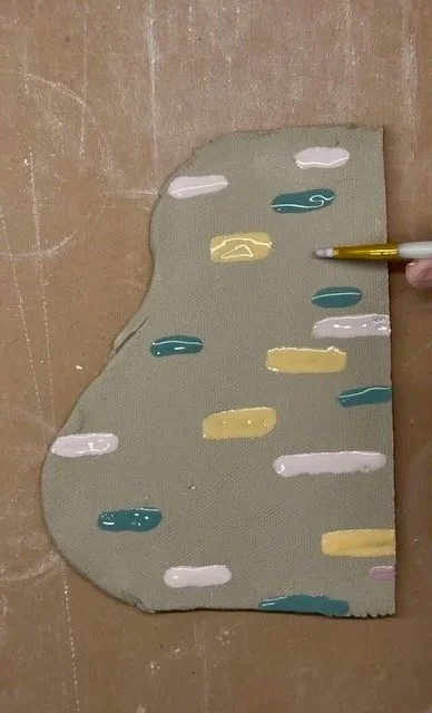 painting the clay slab