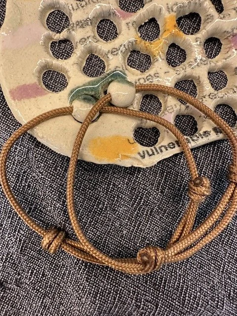 dot bracelets on the skeleton 