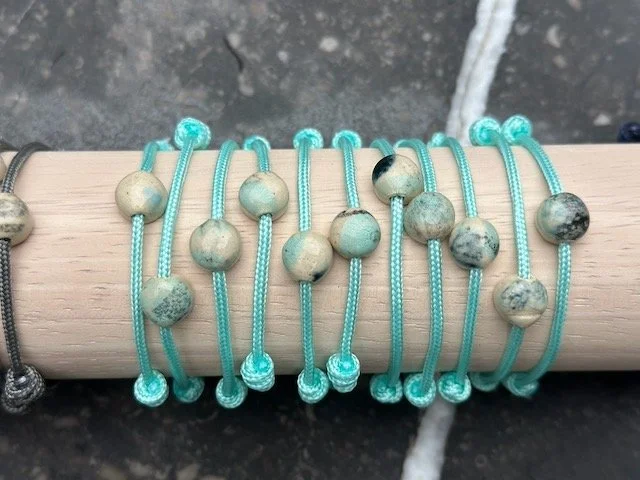 dots with aqua on aqua paracord