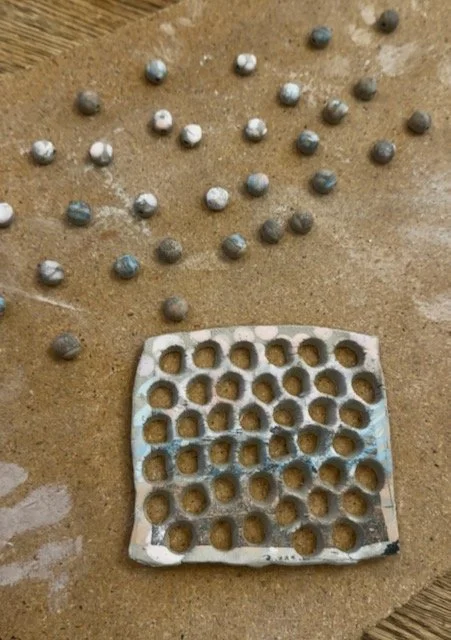 dots and slab skeleton pre-bisque firing