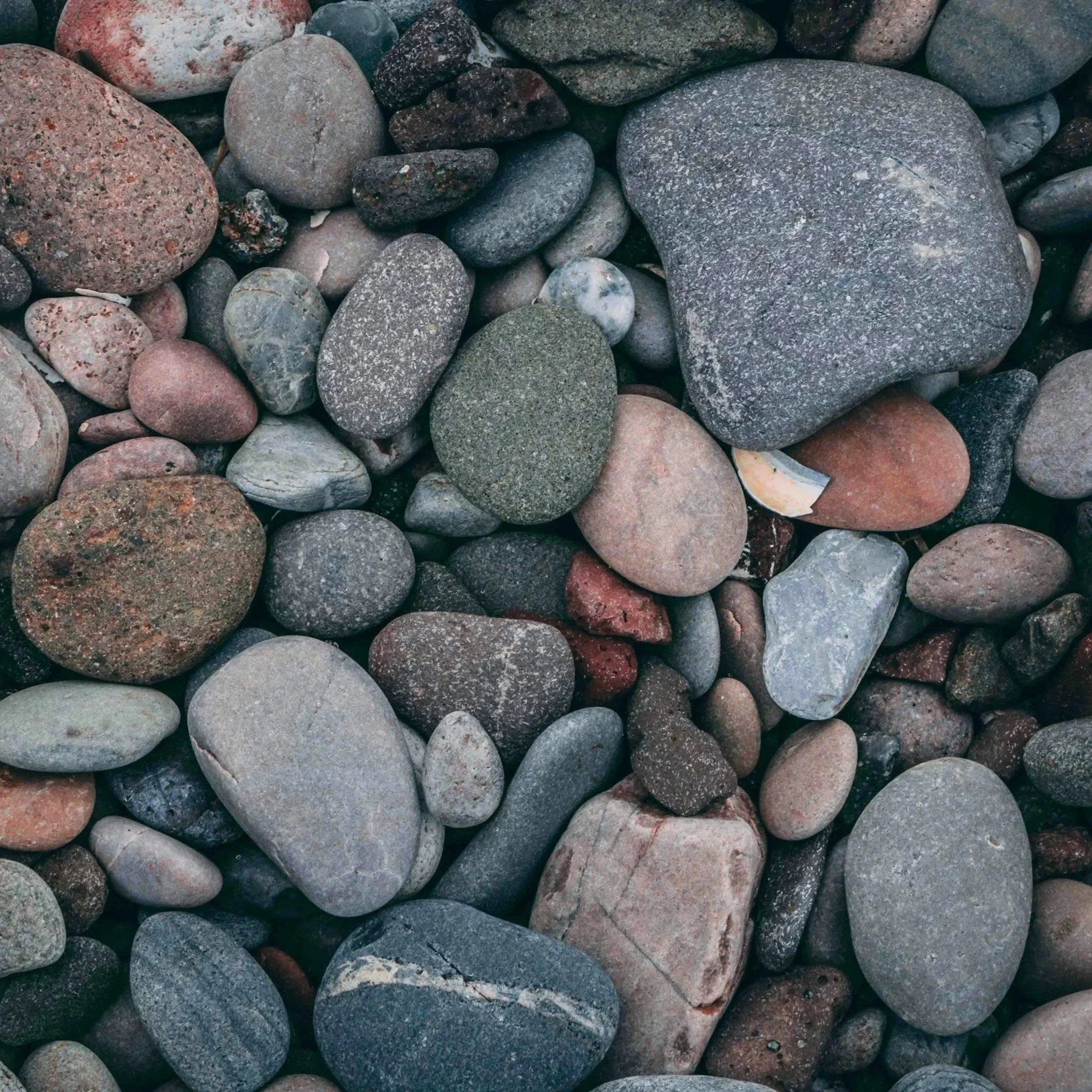 Geometric drawing of an outline square with sections divided by vertical, horizontal, and diagonal lines.