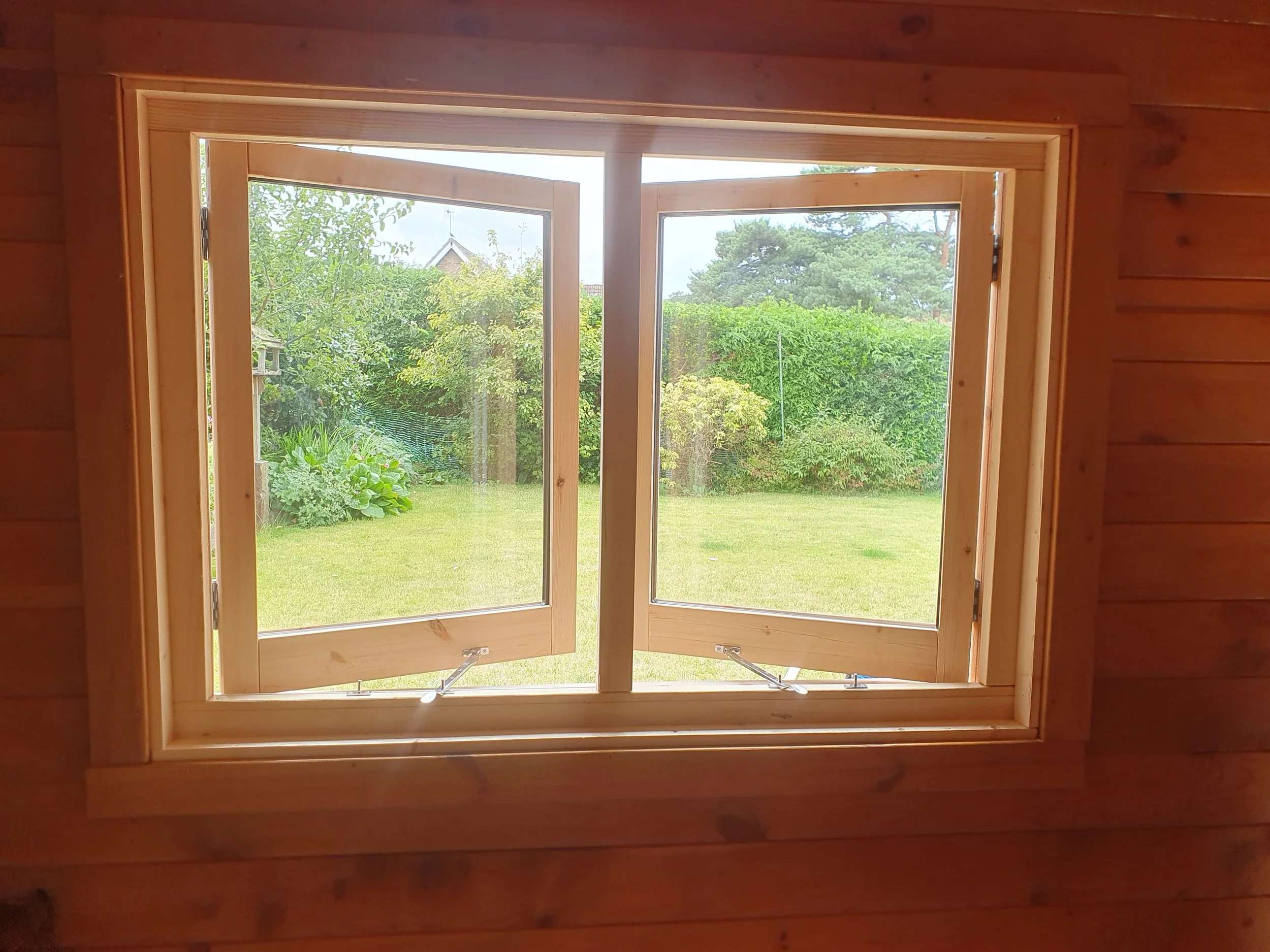 Custom timber window installation in Sheringham, North Norfolk.
