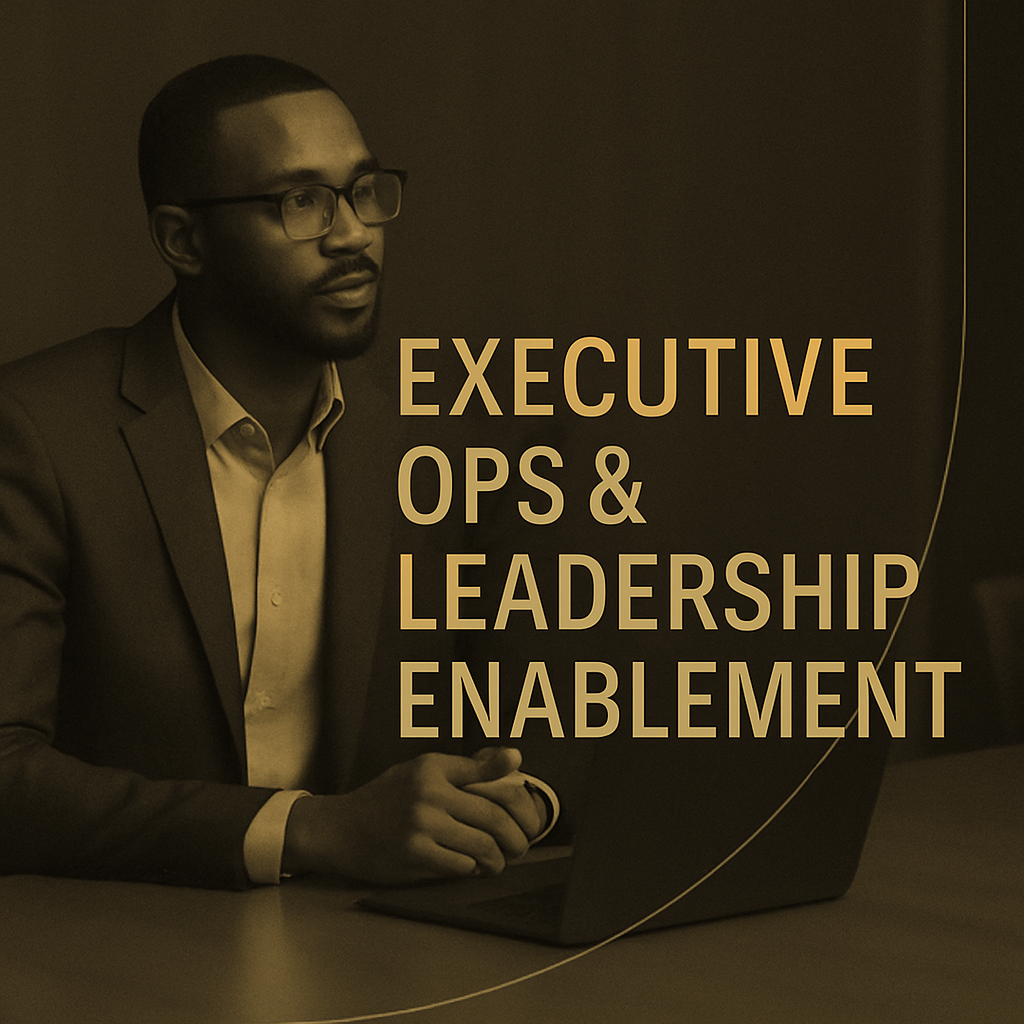 A man in a business suit and glasses sitting at a desk with a laptop, with the words 'Executive Ops & Leadership Enablement' overlaid on the image.