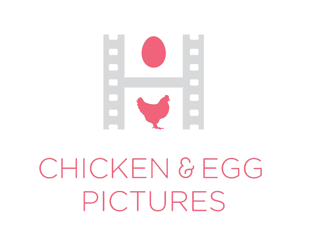 Colorful digital illustration of a cooking-themed logo with a chicken, an egg, and text that reads "Kitchen & Cooking" and "Puzzles" in bright colors.