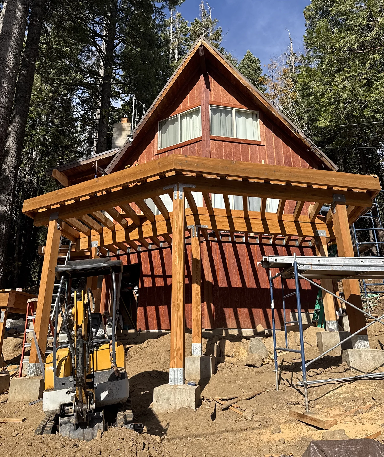 new deck construction with a-frame house