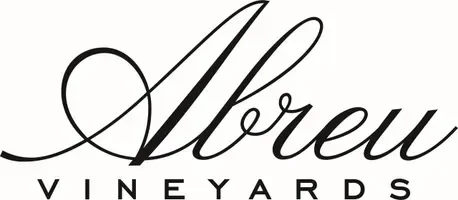 Logo for Arew Vineyards featuring elegant cursive text