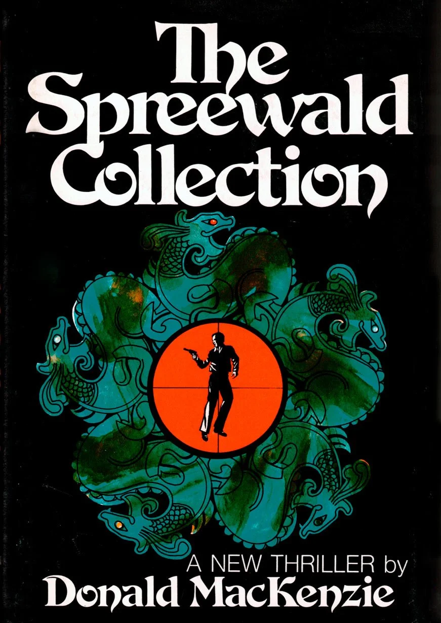 Book cover titled "The Spreevald Collection" featuring a silhouette of a man holding a gun inside an orange circle, surrounded by stylized dragons on a black background, with the subtitle "A New Thriller" and author name "Donald MacKenzie".