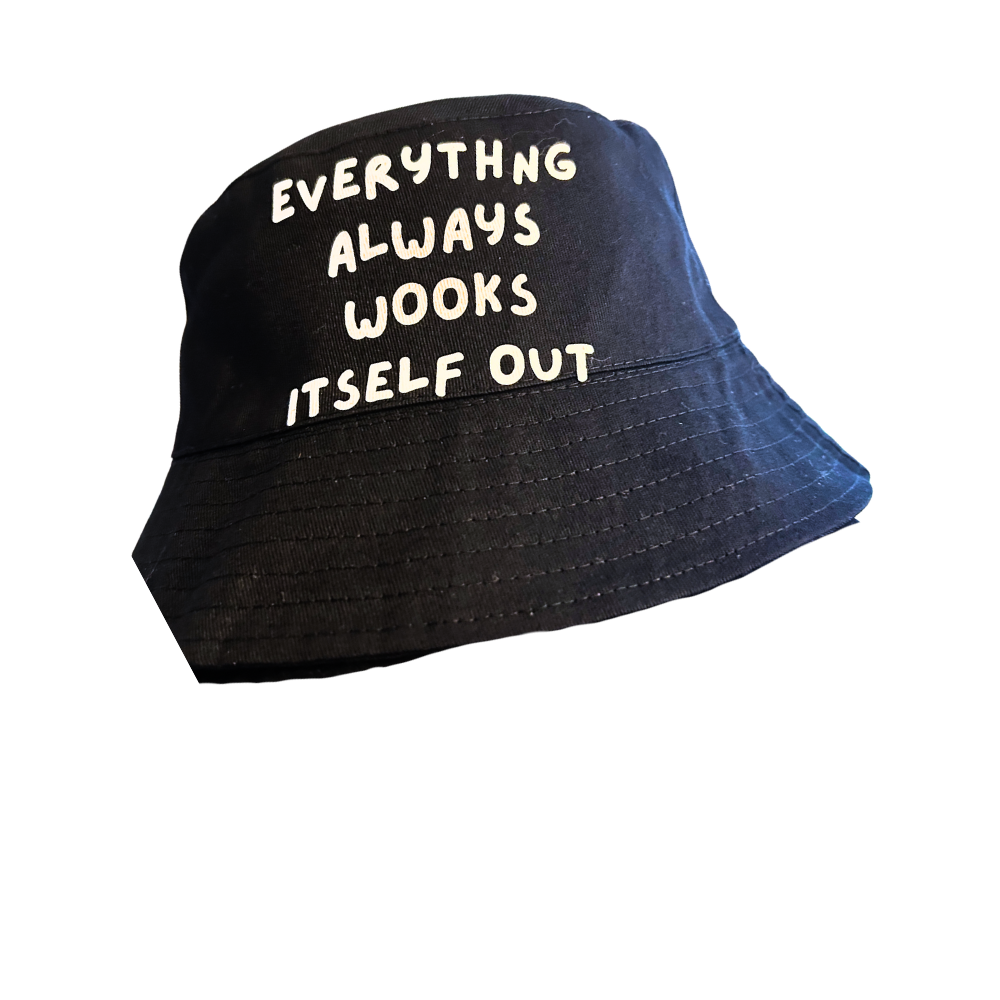 Black bucket hat with white embroidered text that reads "Everything always looks itself out."
