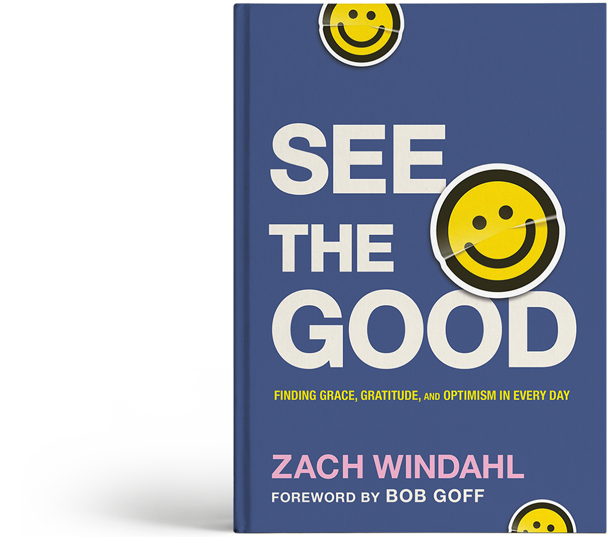 Book titled "See the Good" by Zach Windahl with a foreword by Bob Goff, featuring smiley face stickers on the cover.