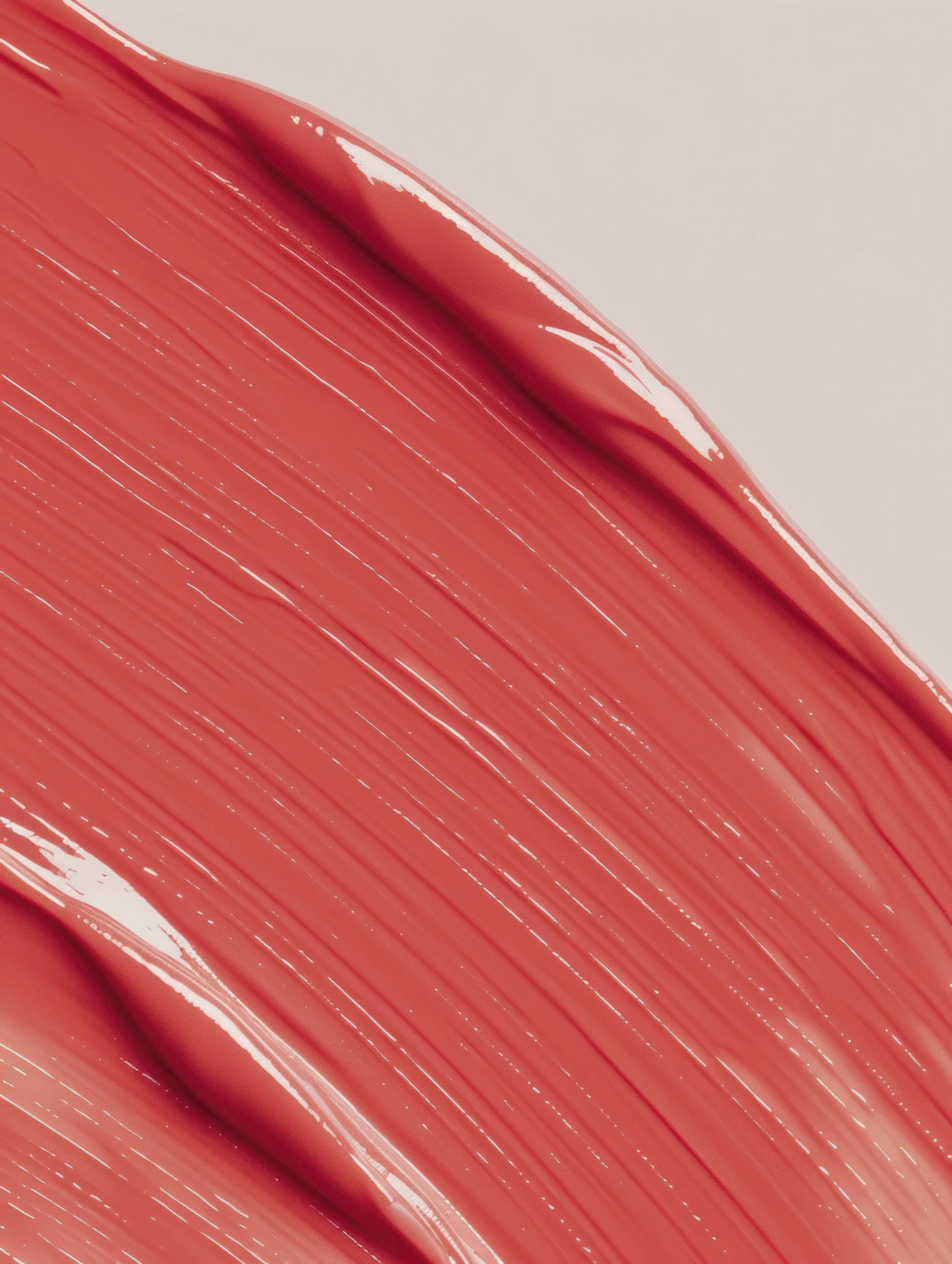 Close-up of a painted surface with glossy, streaked pink and white paint.