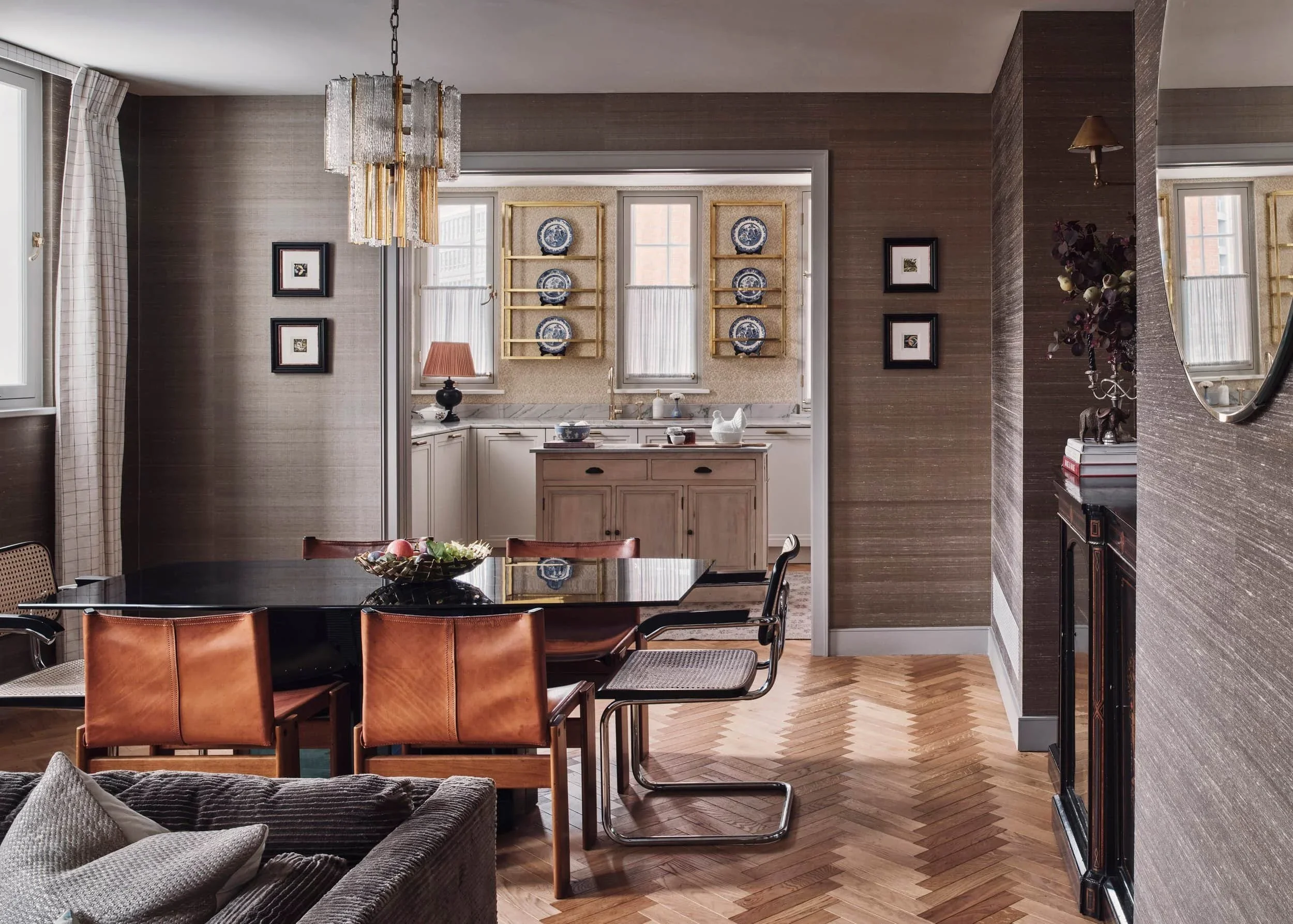 Studio L London dining and kitchen interior at Westminster Fire Station with leather chairs and herringbone flooring