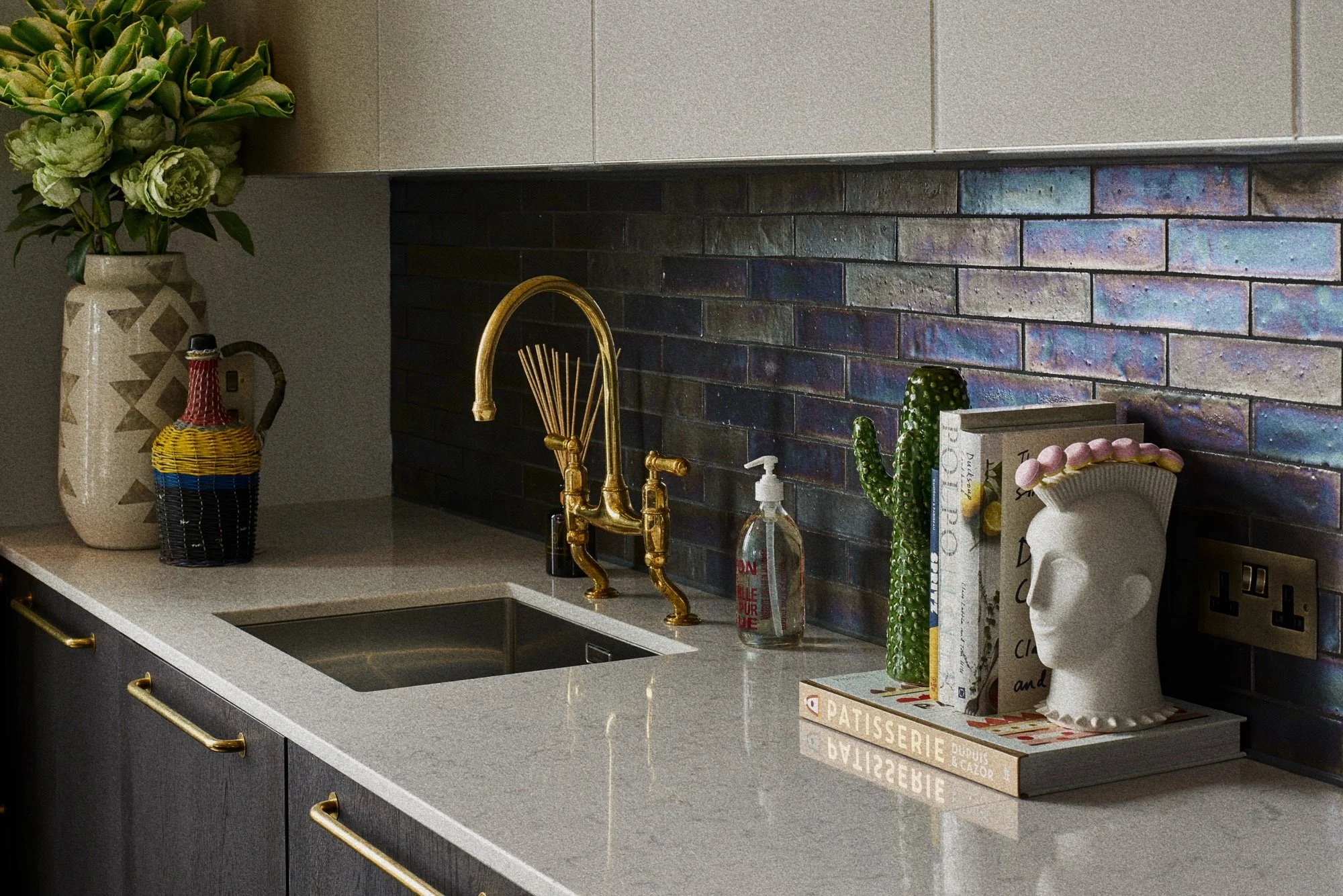 Studio L London kitchen styling with layered colour, art and decorative objects