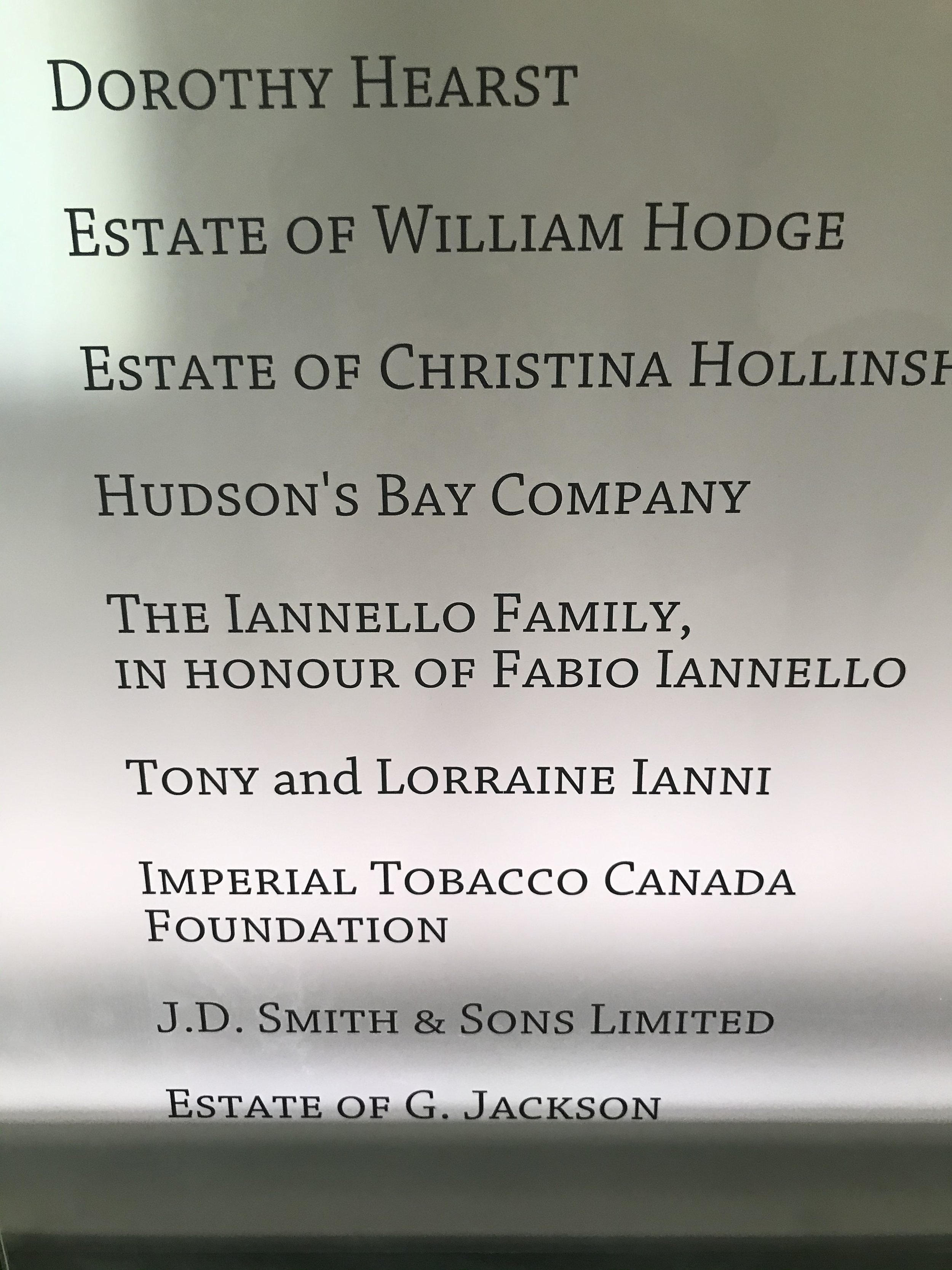 Plaque with multiple names and estates, including Dorothy Hearst, William Hodge, Christina Hollings, Hudson's Bay Company, the Iannello Family in honor of Fabio Iannello, Tony and Lorraine Ianni, Imperial Tobacco Canada Foundation, J.D. Smith & Sons Limited, and estate of G. Jackson.