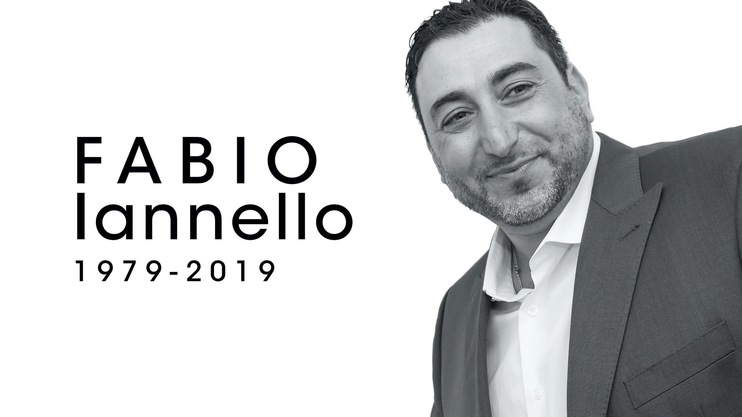 Black and white portrait of Fabio Iannello wearing a suit, with text indicating his name and lifespan from 1979 to 2019.