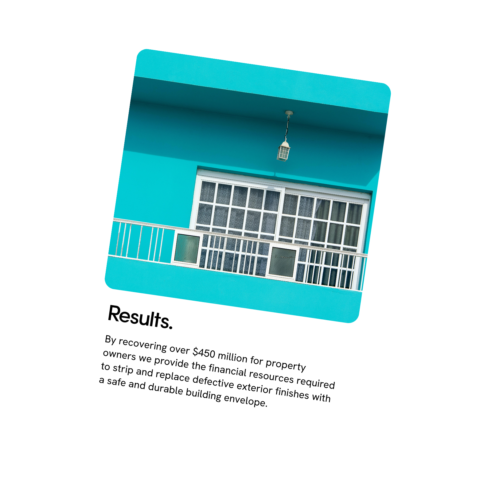 A bright blue residential building with a sliding glass door, a white balcony railing, and a small outdoor light fixture hanging from the ceiling.