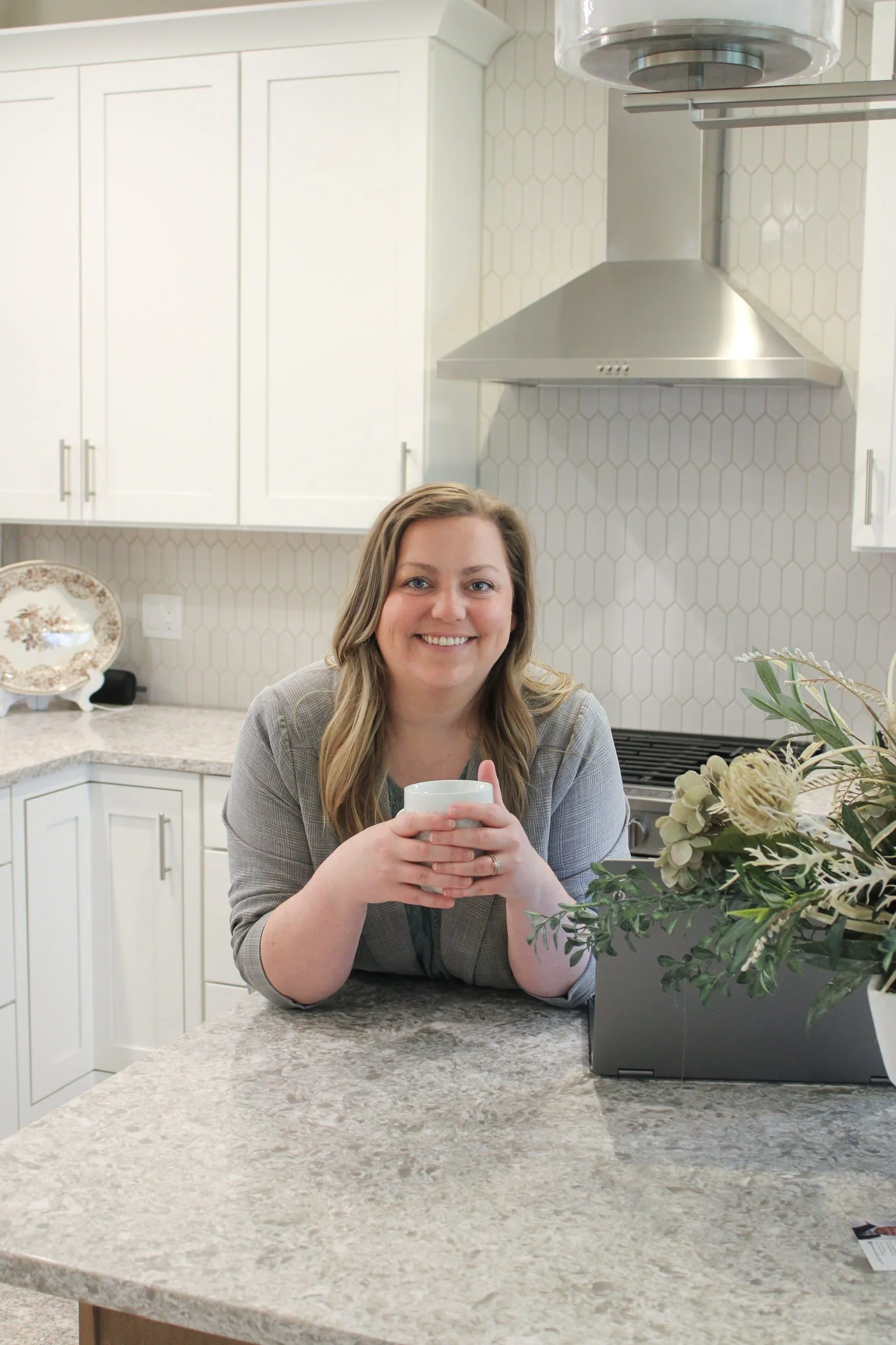 jessica wilson bookkeeper for creatives smiling in kitchen