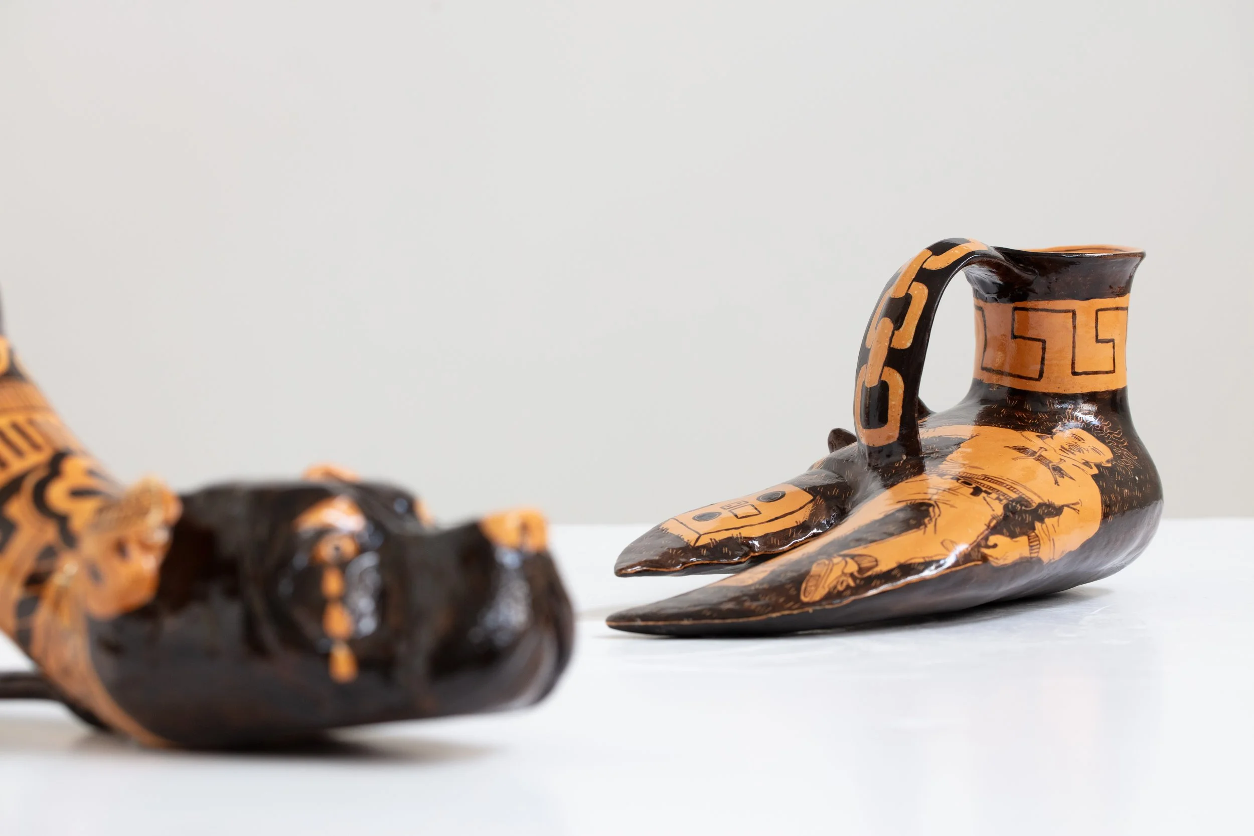 Roberto Lugo: Untitled (Pitbull) Rhyton. 2024. Glazed stoneware. 6.25" (H) x 12" (W) x 6" (D)