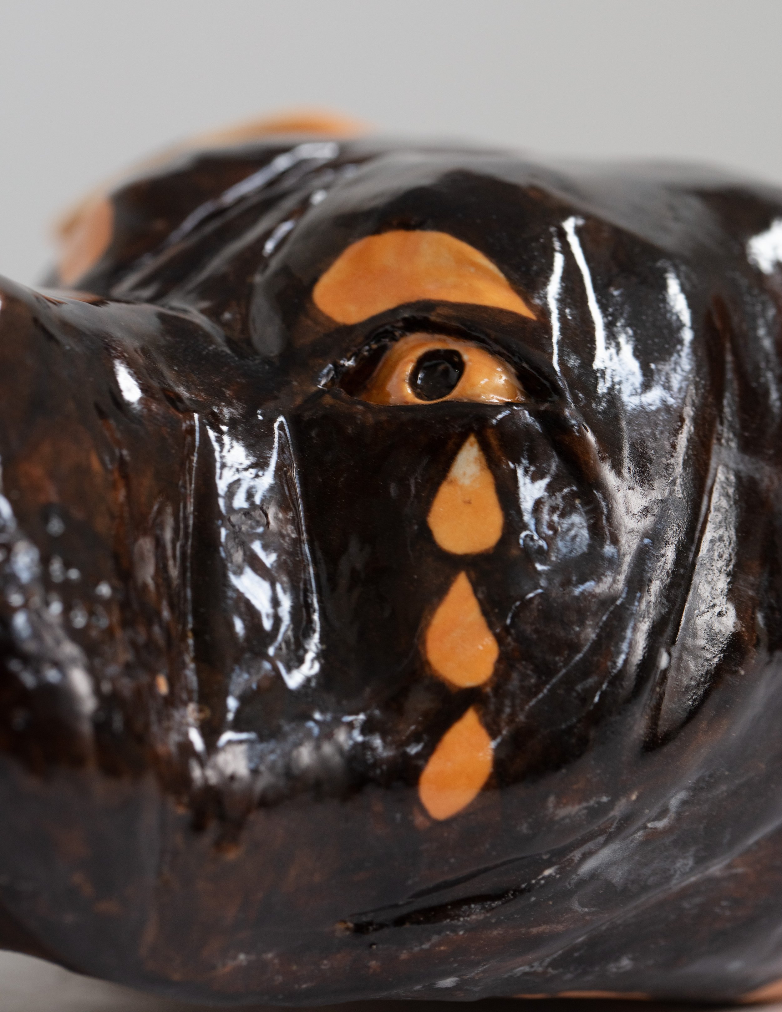 Roberto Lugo: Untitled (Pitbull) Rhyton. 2024. Glazed stoneware. 6.25" (H) x 12" (W) x 6" (D)