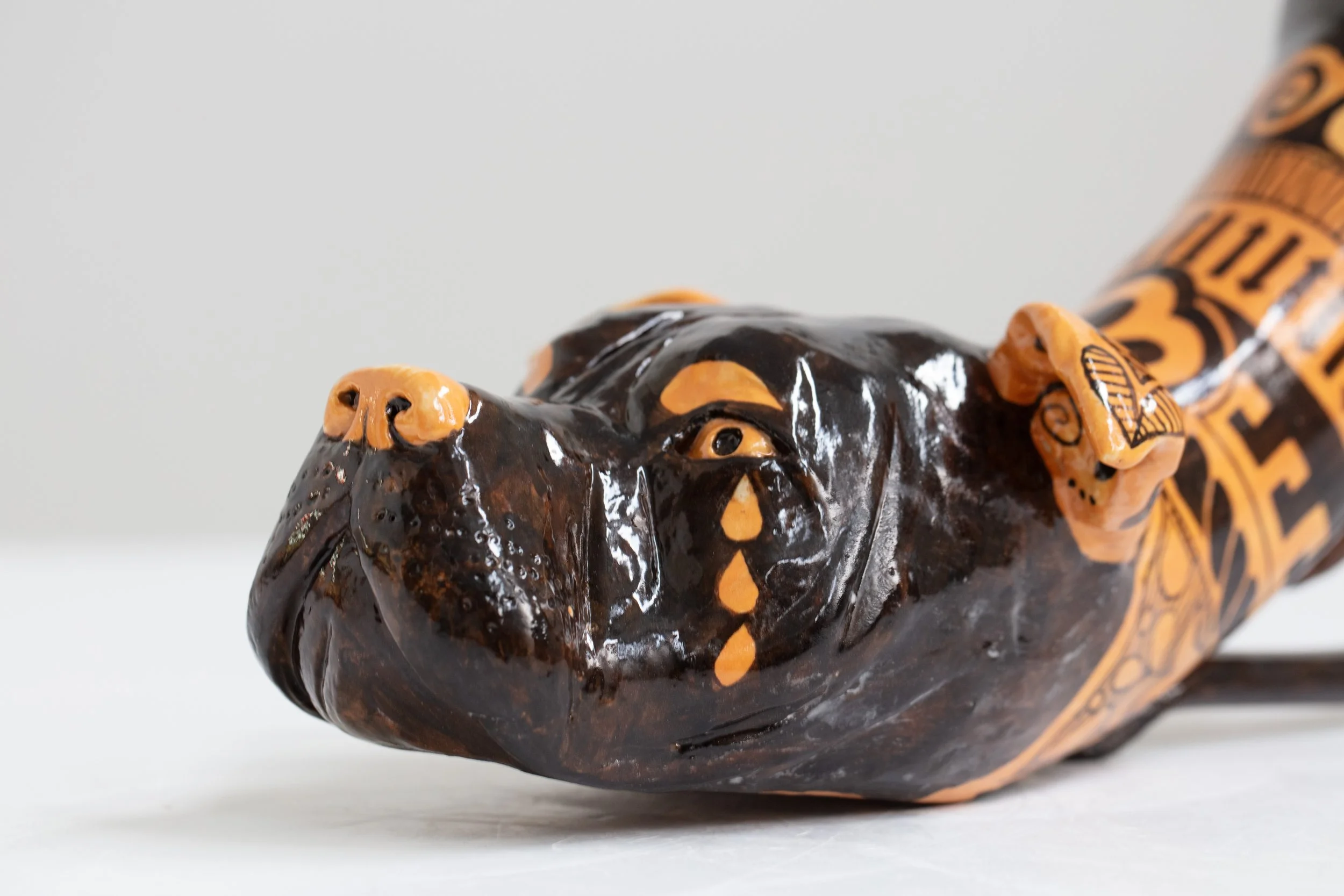 Roberto Lugo: Untitled (Pitbull) Rhyton. 2024. Glazed stoneware. 6.25" (H) x 12" (W) x 6" (D)