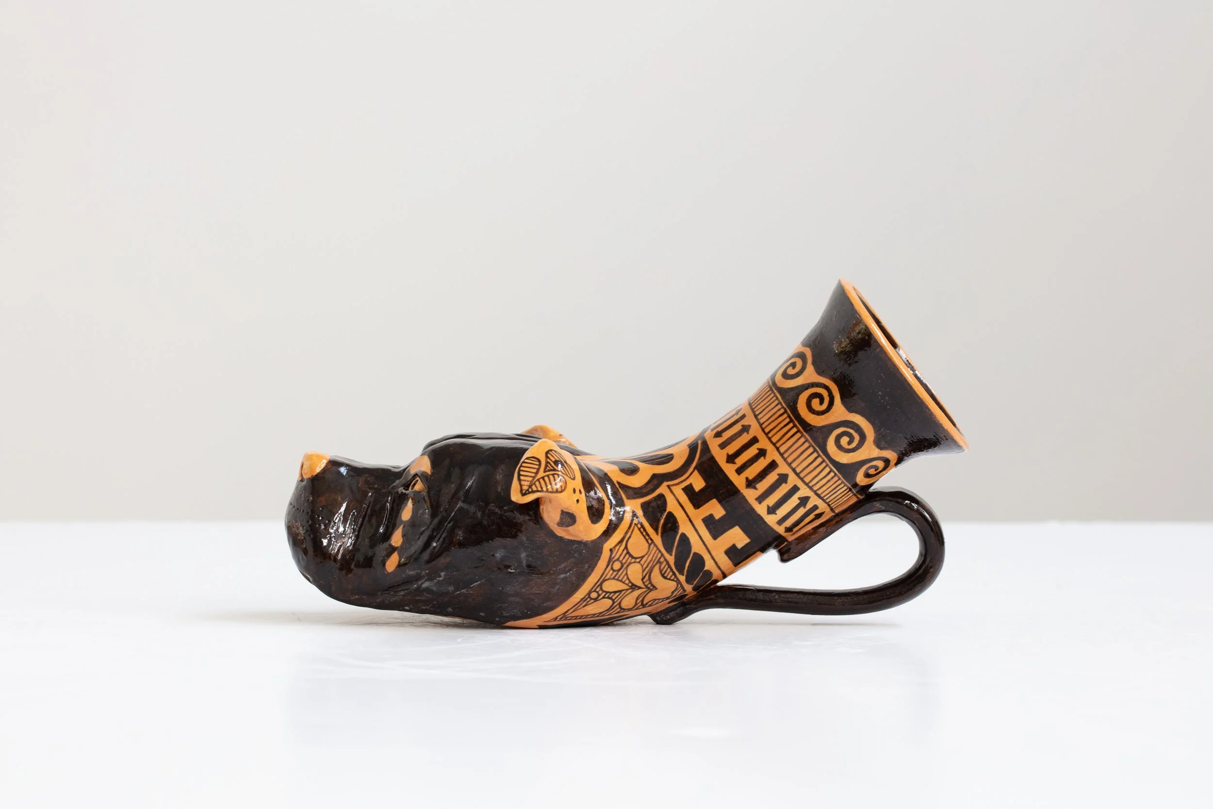 Roberto Lugo: Untitled (Pitbull) Rhyton. 2024. Glazed stoneware. 6.25" (H) x 12" (W) x 6" (D)