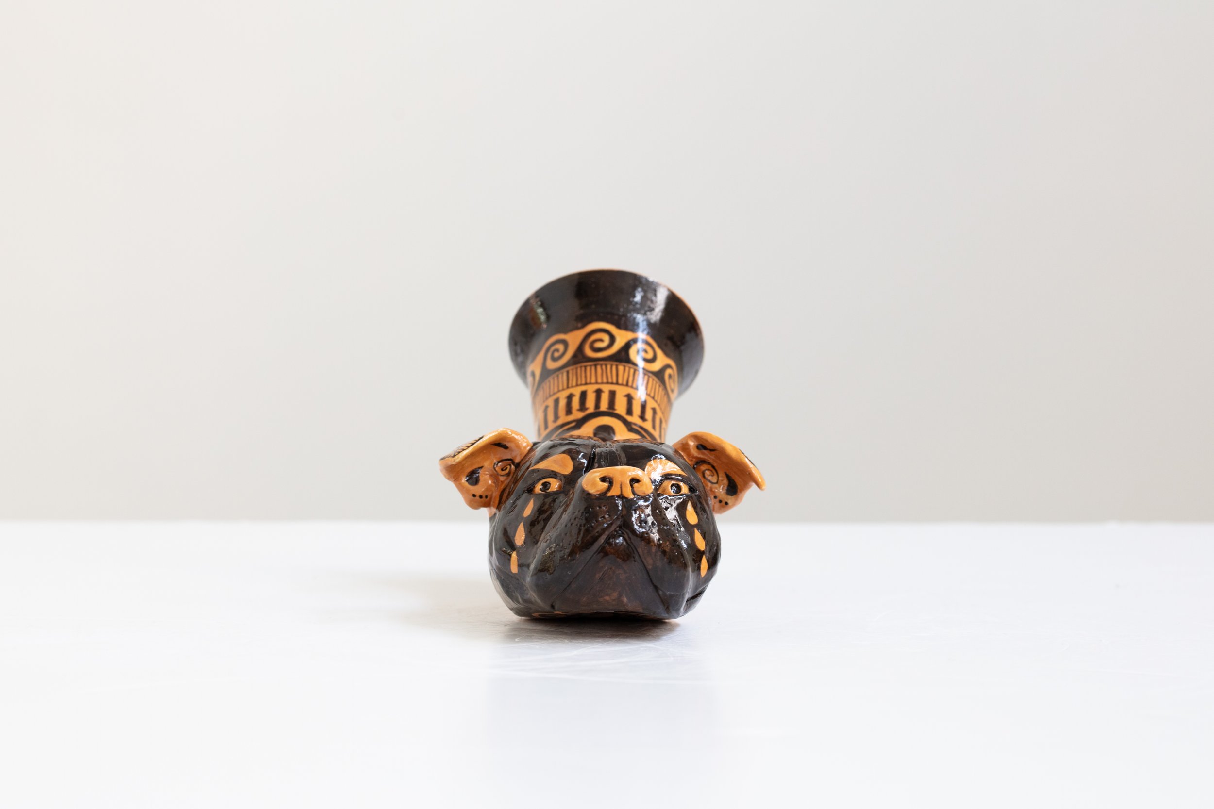Roberto Lugo: Untitled (Pitbull) Rhyton. 2024. Glazed stoneware. 6.25" (H) x 12" (W) x 6" (D)