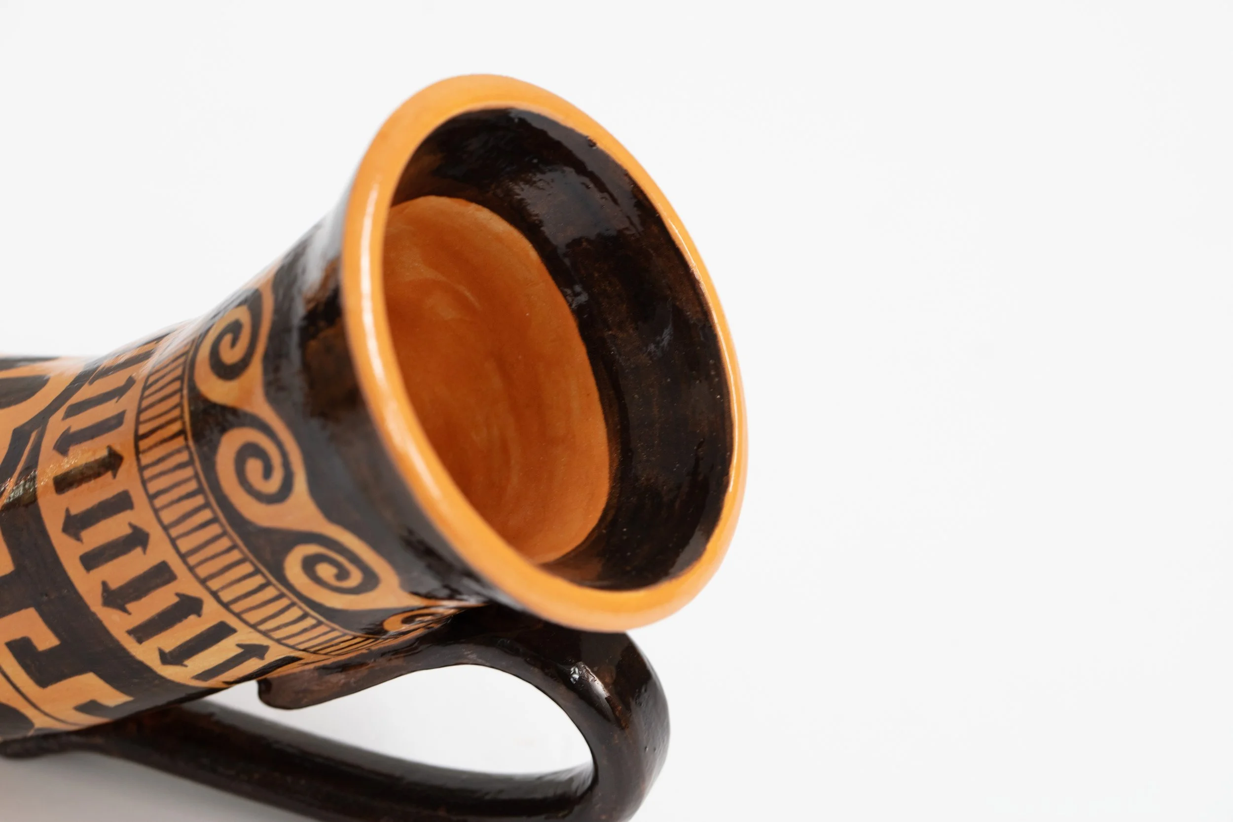 Roberto Lugo: Untitled (Pitbull) Rhyton. 2024. Glazed stoneware. 6.25" (H) x 12" (W) x 6" (D)