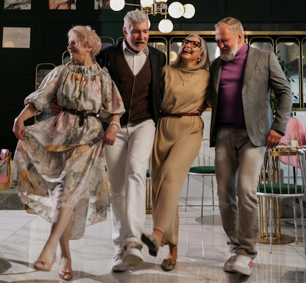 Four seniors dancing and smiling while having fun and making friends at OklaMOTION Dance Studio in Henryetta, OK