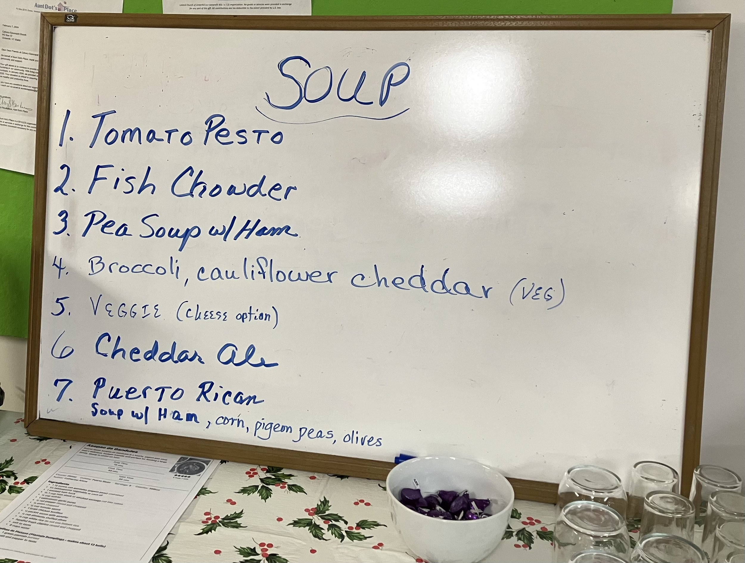 White board with names of seven different soups, all delicious!