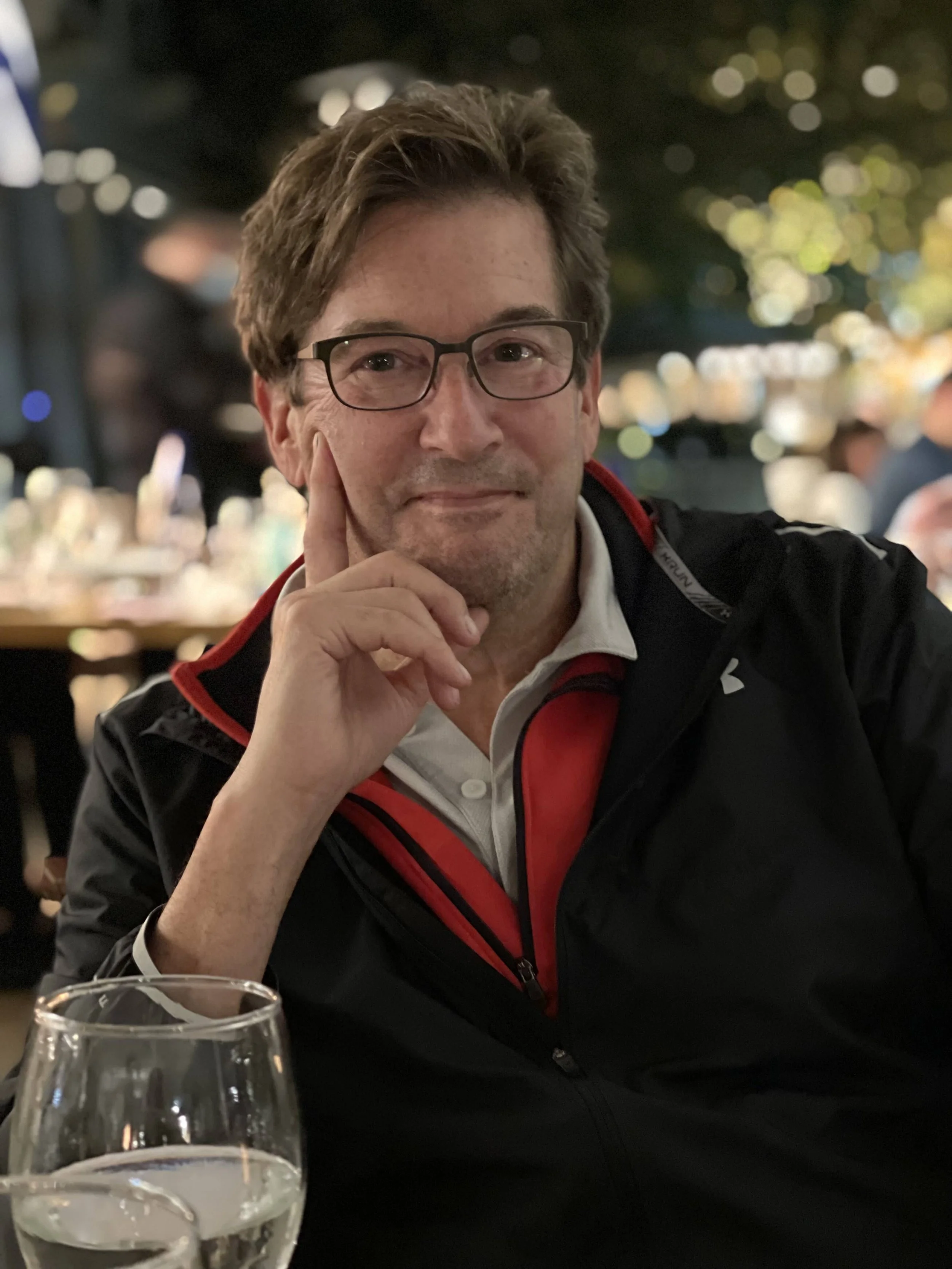 Calvary Senior Warden Jack Manning wearing glasses and a blue and red shirt.