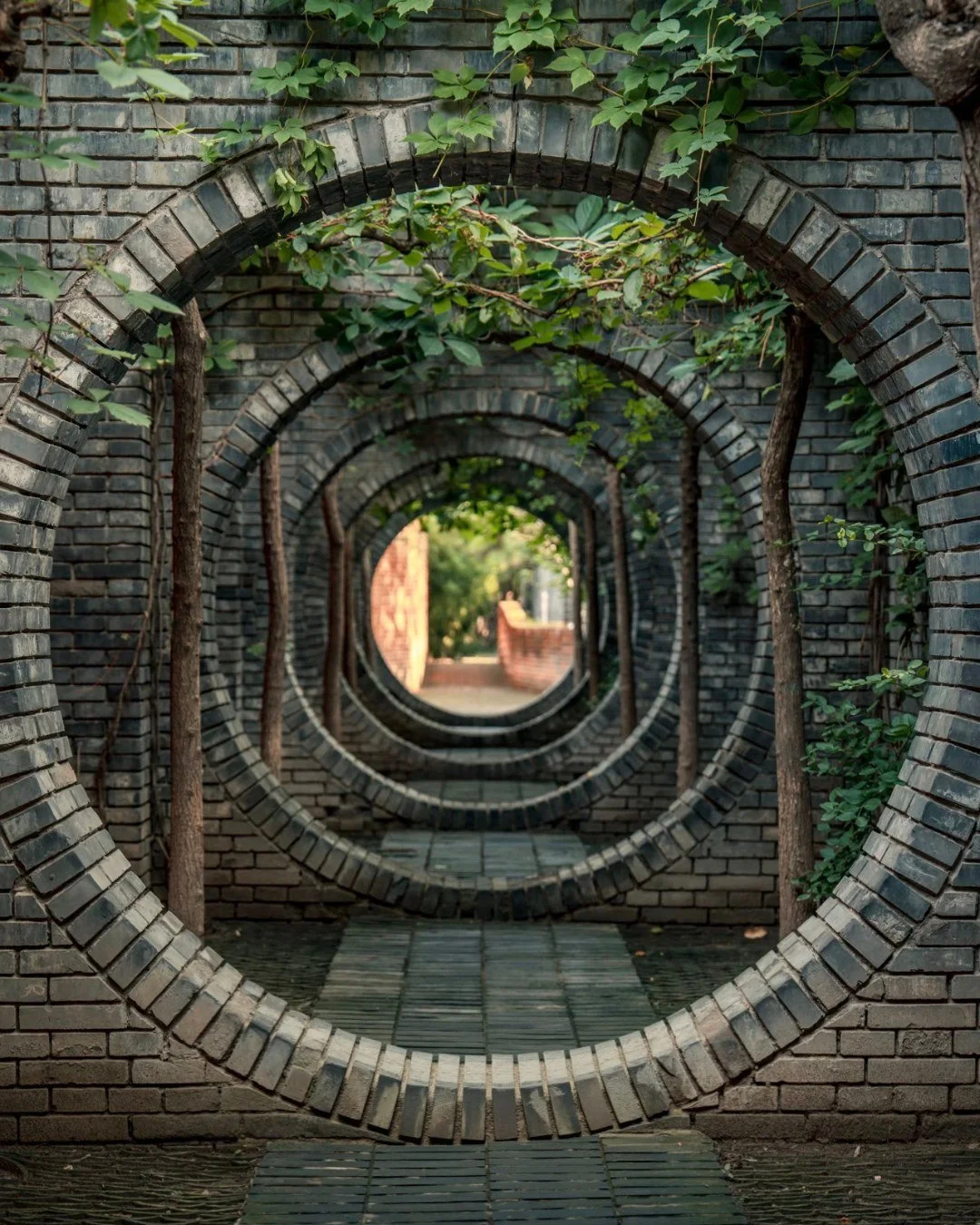 Made of 800,000 handcrafted bricks, Beijing's Red Brick Art Museum blends the contemporary and the classical. Peking University Dong Yugan's design allows the raw materials to define the experience, and gives traditional Chinese masonry techniques th