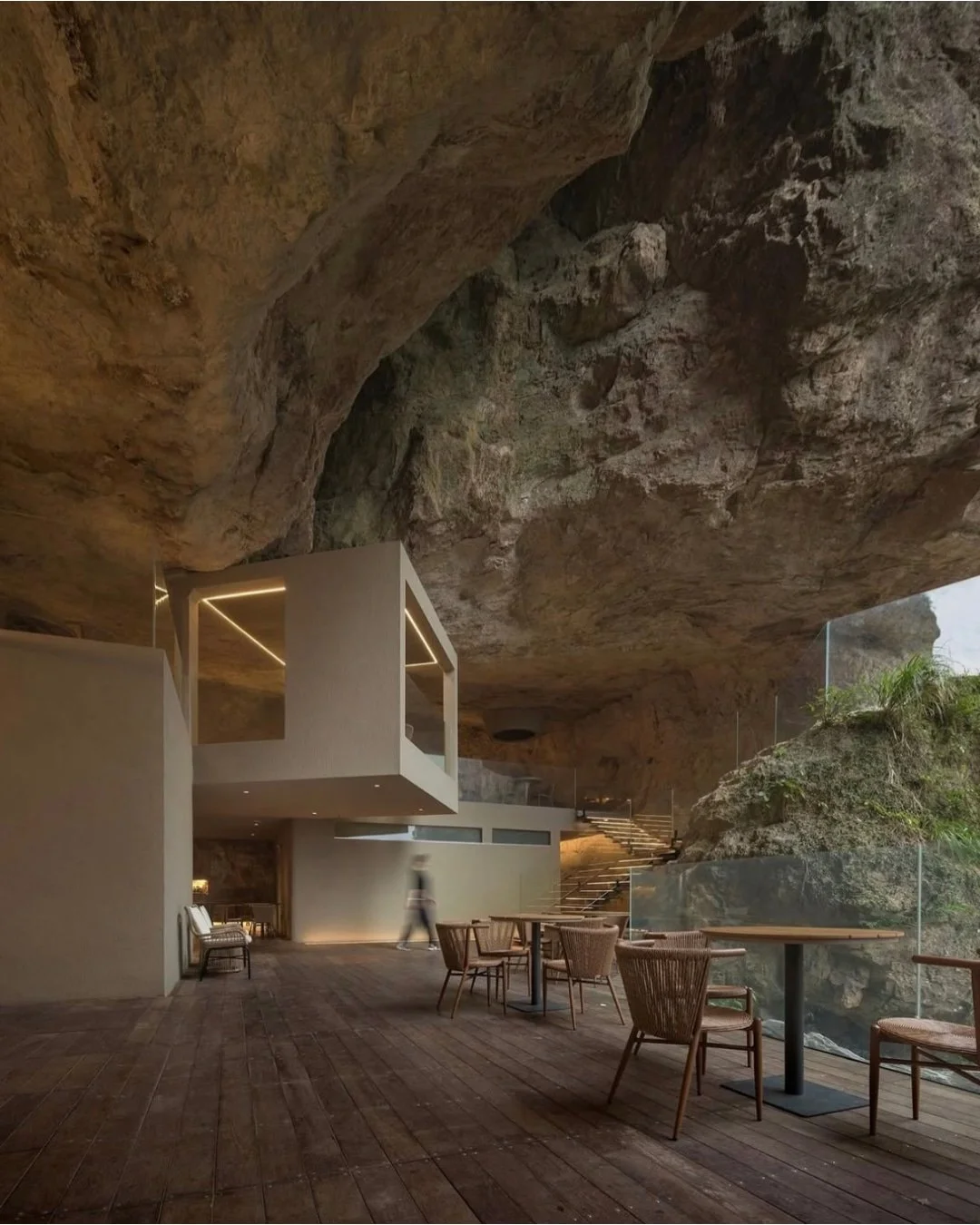Hangzhou-based Slow Coral Design has transformed two existing cliffside caves along Yandang Mountain's Fangdong-to-Lingyan route into a pair of cliff caf&eacute;s, specifically designed to invite a younger generation of hikers to this UNESCO Global G