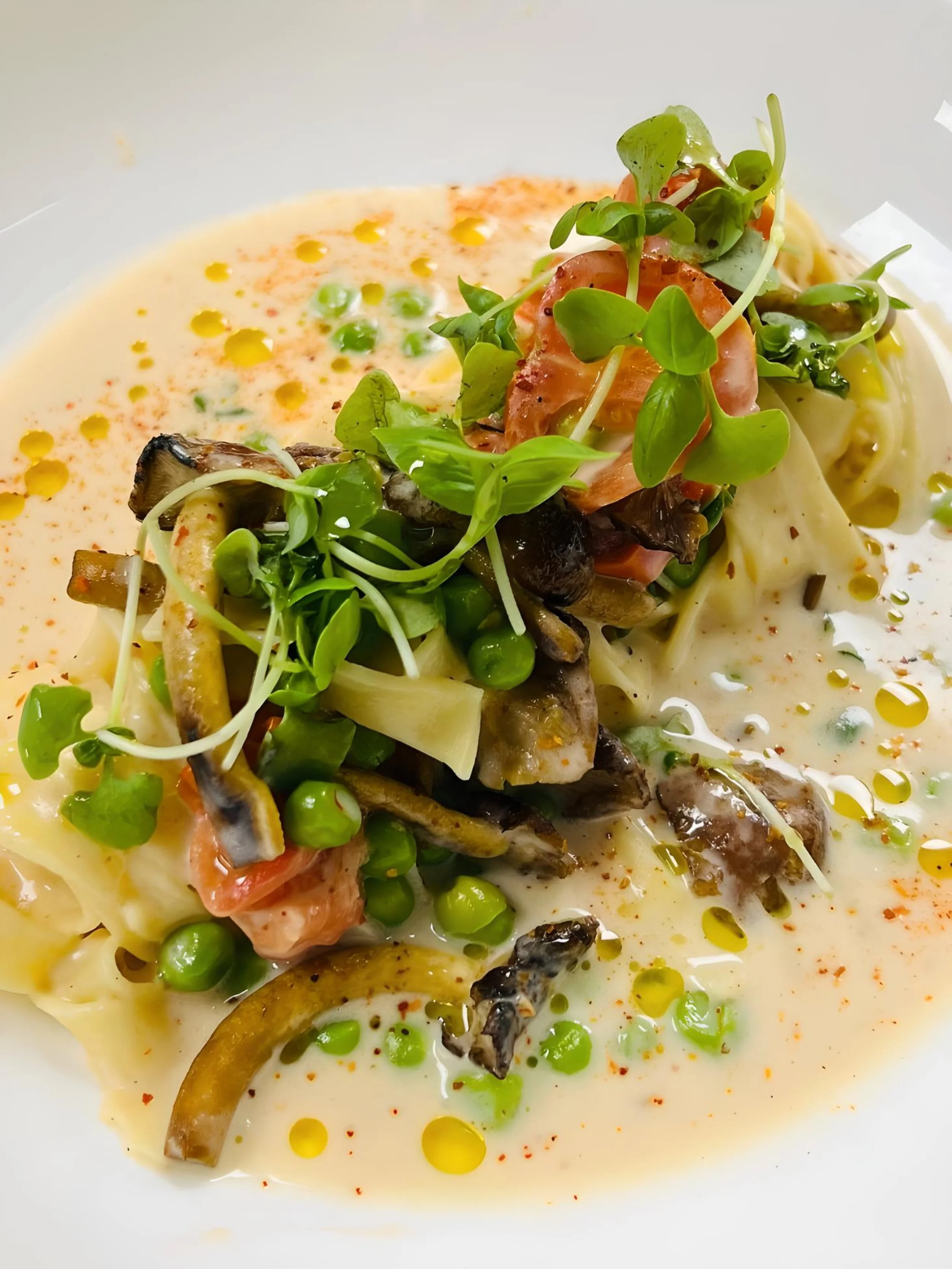Tagliatelle, Wild Mushrooms, Peas, Heirloom Cherry Tomato's, Lemon Burre Monte, Lemon Oil, Micro Basil 