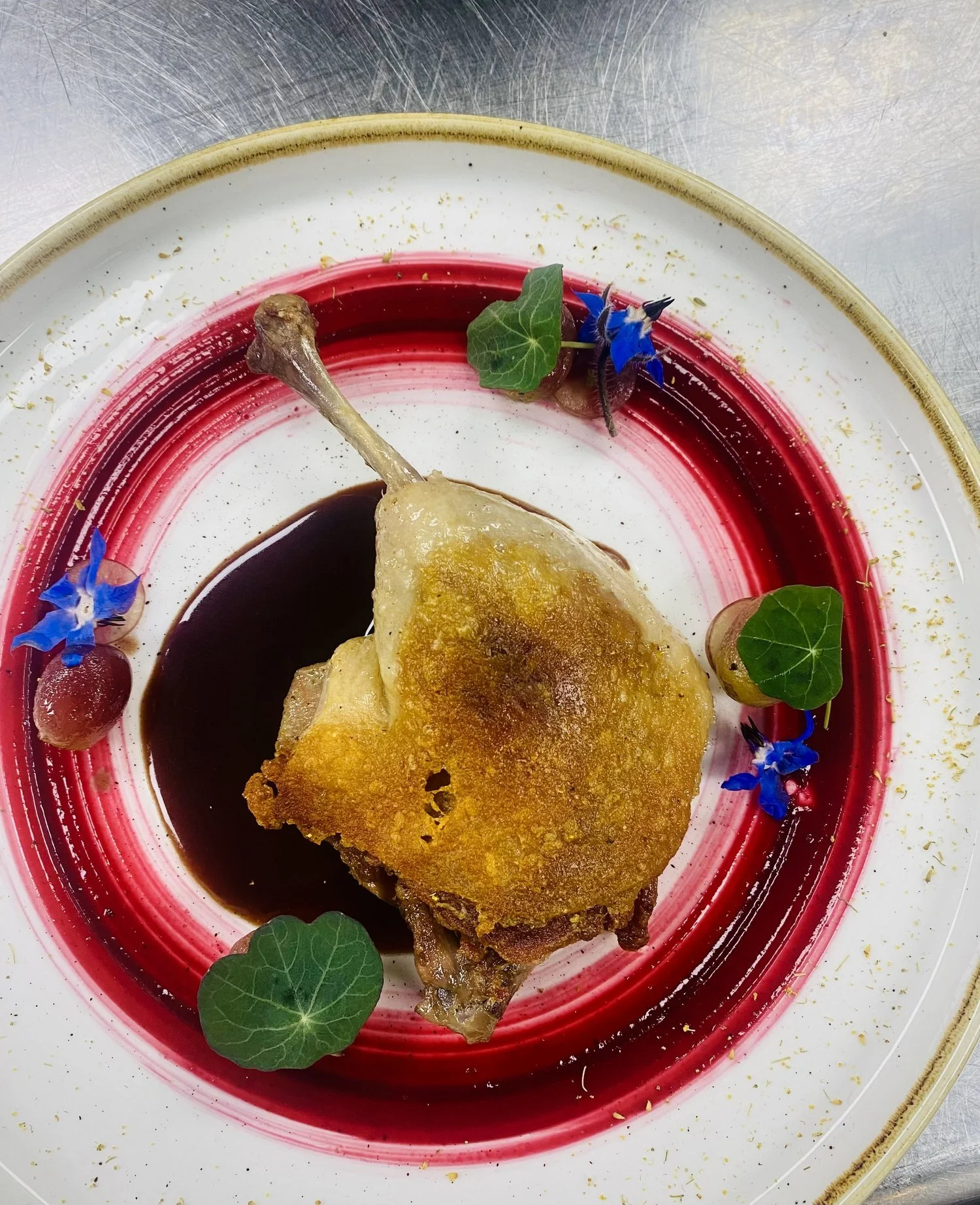 Duck Confit, Duck Jus, Potato Fennel Lyonnaise, Red Currant Gastrique, Pickled Red Currant