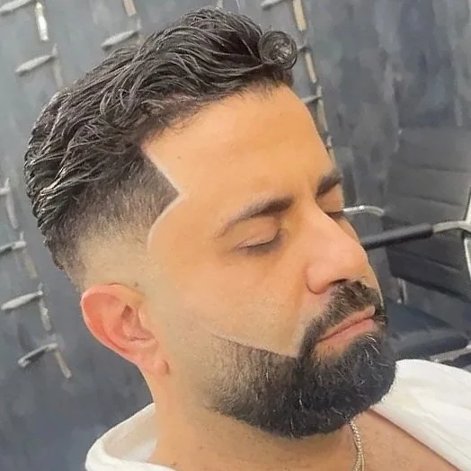 Fade haircut and beard styling