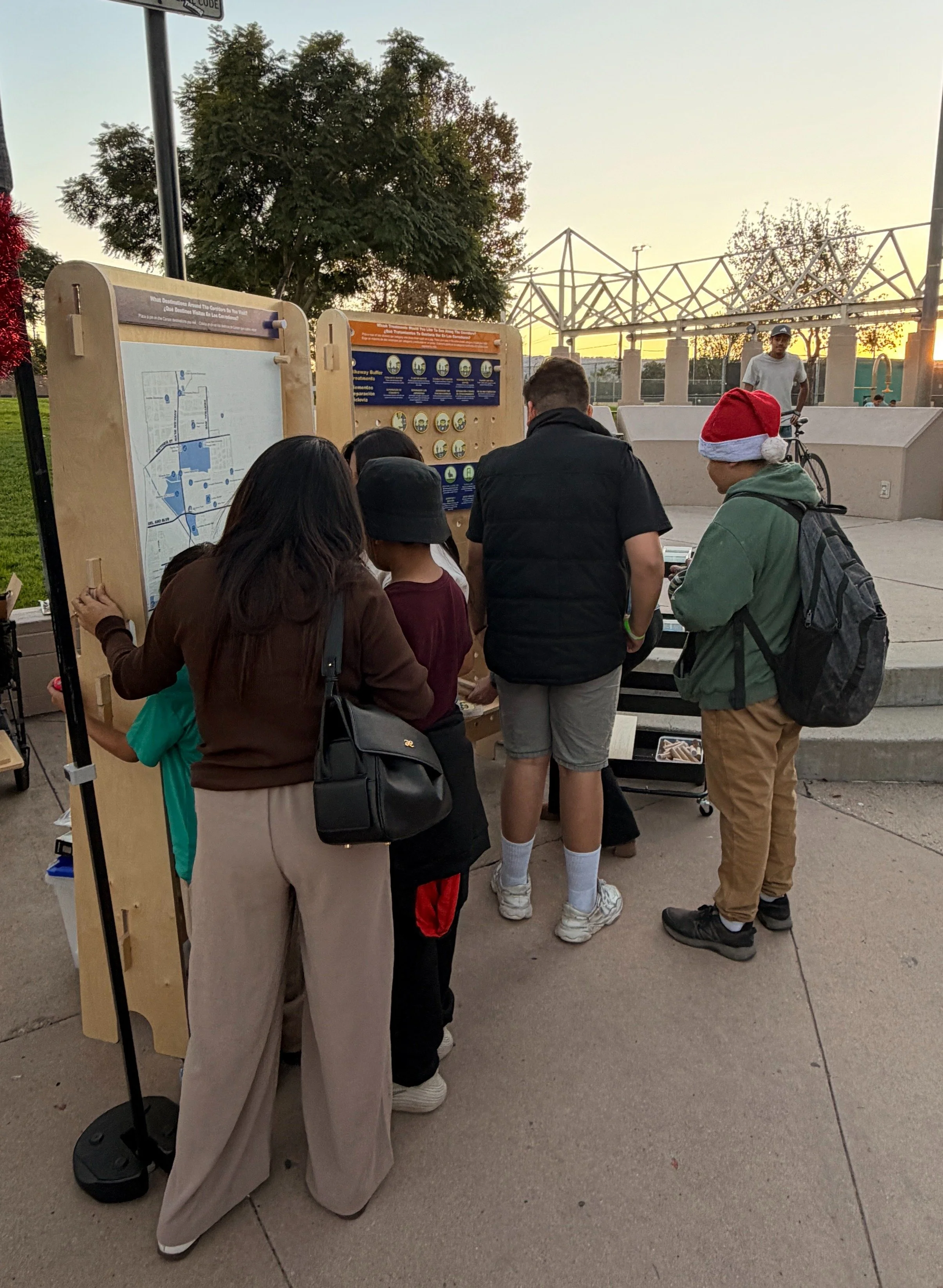 People looking at an outreach board
