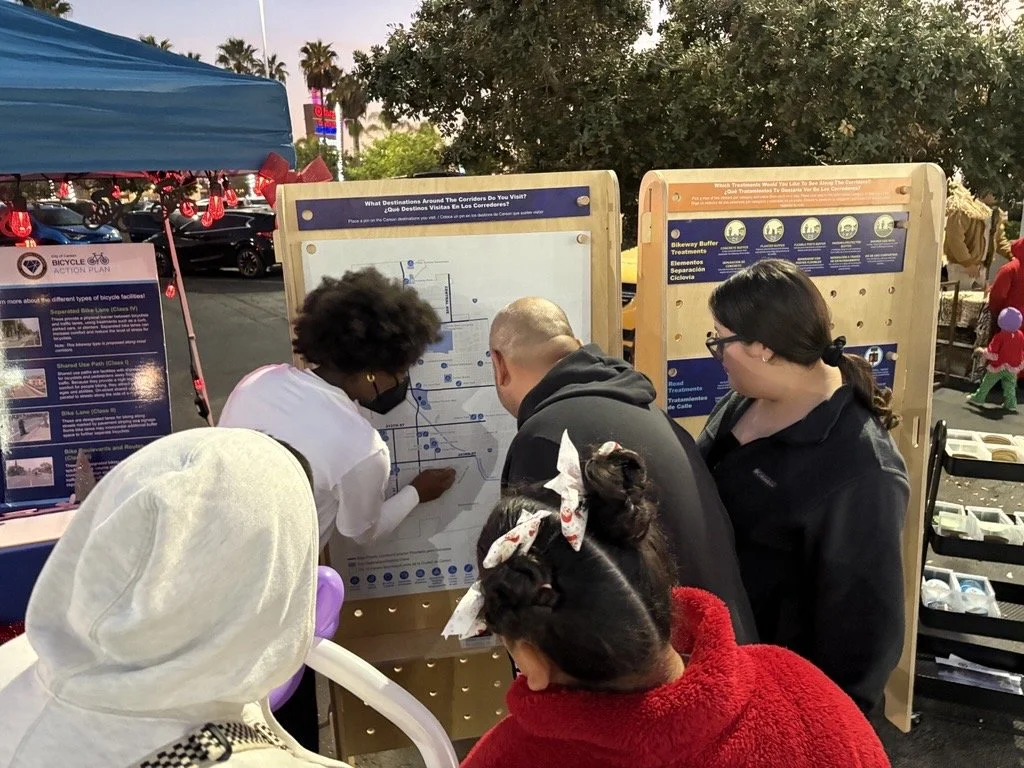 People looking at outreach board