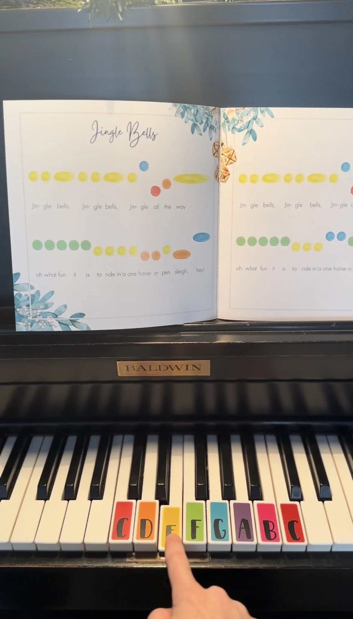5 Mini Mozarts Piano Christmas Carols Alison Seipp Preschool Piano Lessons Jingle Bells on Baldwin Piano with Hands on Keys.jpeg