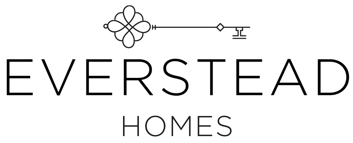 A black and white logo for a company called 'KBH Homes' featuring a stylized floral design at the top, with a straight line, diamond shape, and a small house icon next to the word 'HOMES'.