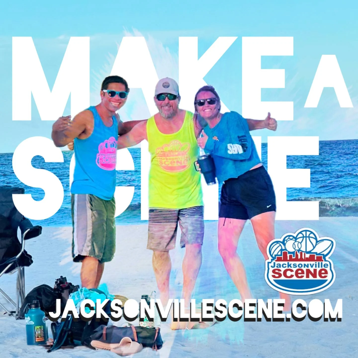 Three people standing on a beach with the ocean in the background, smiling and giving thumbs up. They are dressed in athletic clothing, wearing sunglasses, and seem to be enjoying a sunny day. Large white text overlays the image saying 'MAKE A SCENE,' and there is a logo that says 'Jacksonville Scene' at the bottom right corner along with a website URL 'JACKSONVILLES scene.com'.