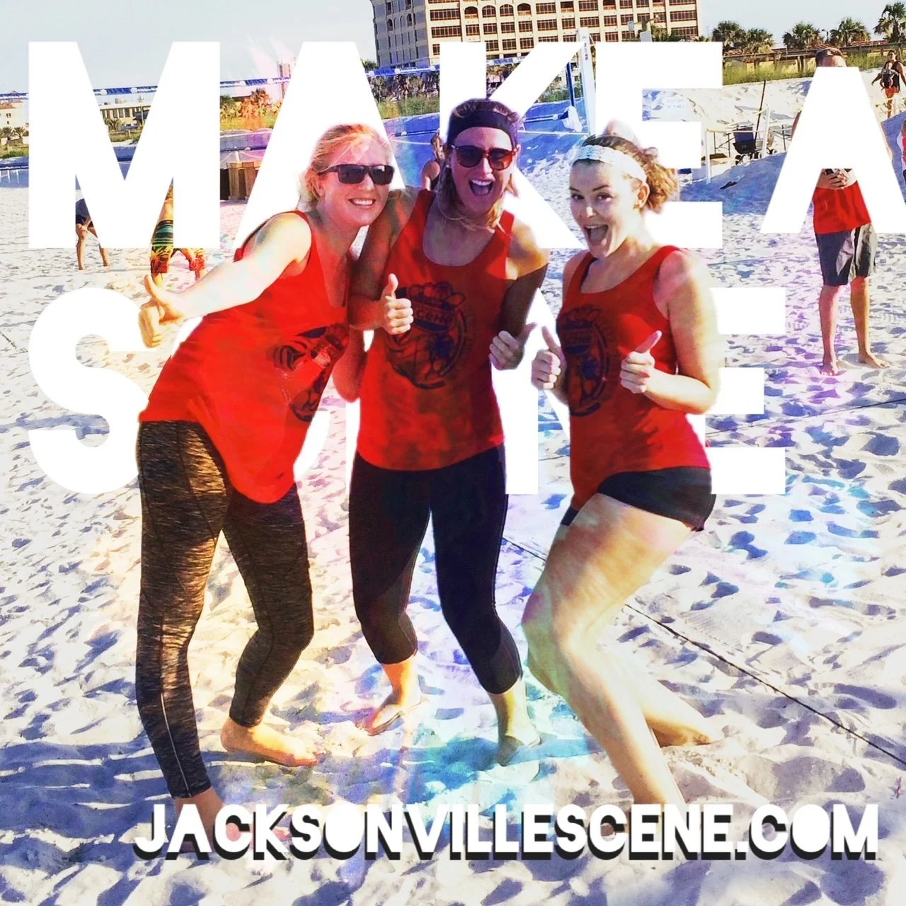 Three women on a sandy beach giving thumbs-up, wearing matching red tank tops with a logo, with large white text overlay reading 'MAKE SAND' and a website URL 'JACKSNVILLESCENE.COM' at the bottom.