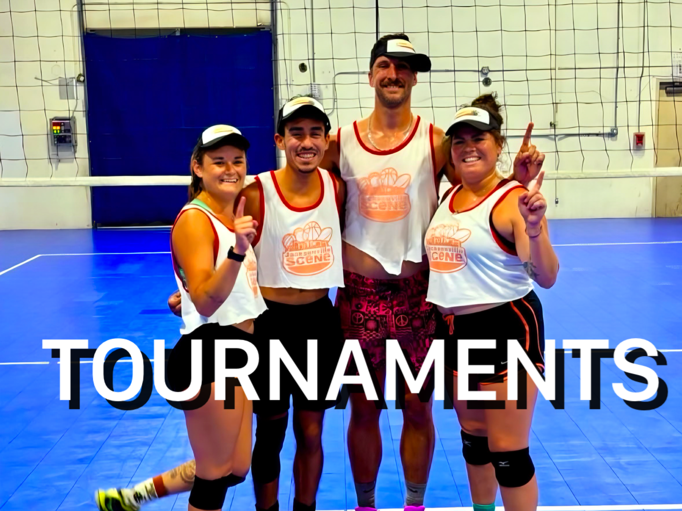 Group of four young adults in volleyball uniforms and hats, smiling and posing on an indoor volleyball court with the word TOURNAMENTS across the photo.