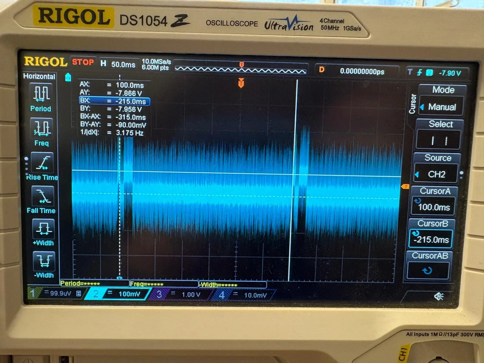 Oscilloscope display showing a complex waveform with various measurements and settings, including voltage, time, and frequency.
