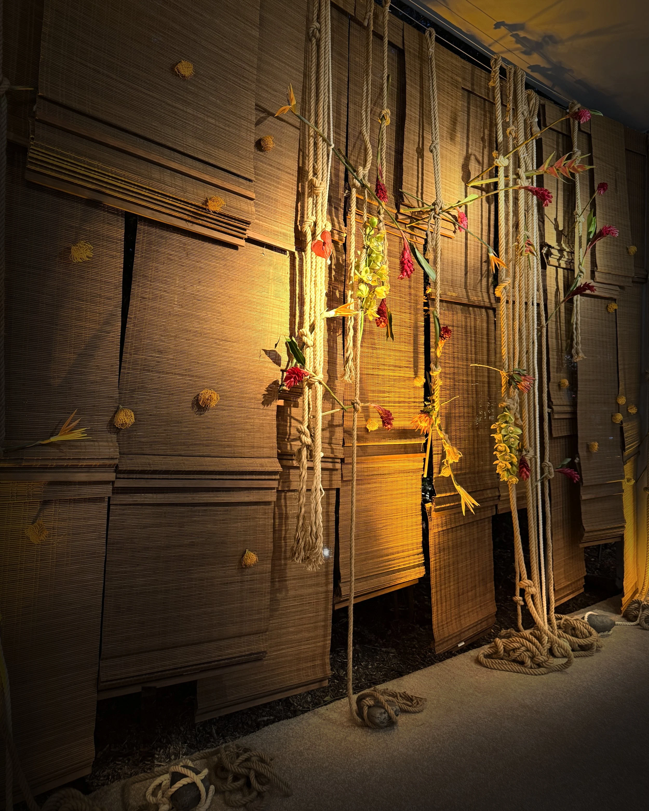 Woven reed and rope event installation inspired by El Anatsui